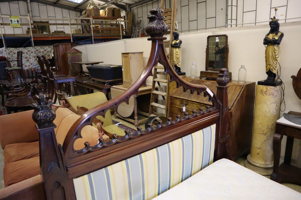 A William IV mahogany Gothic design bedstead, width 140cm